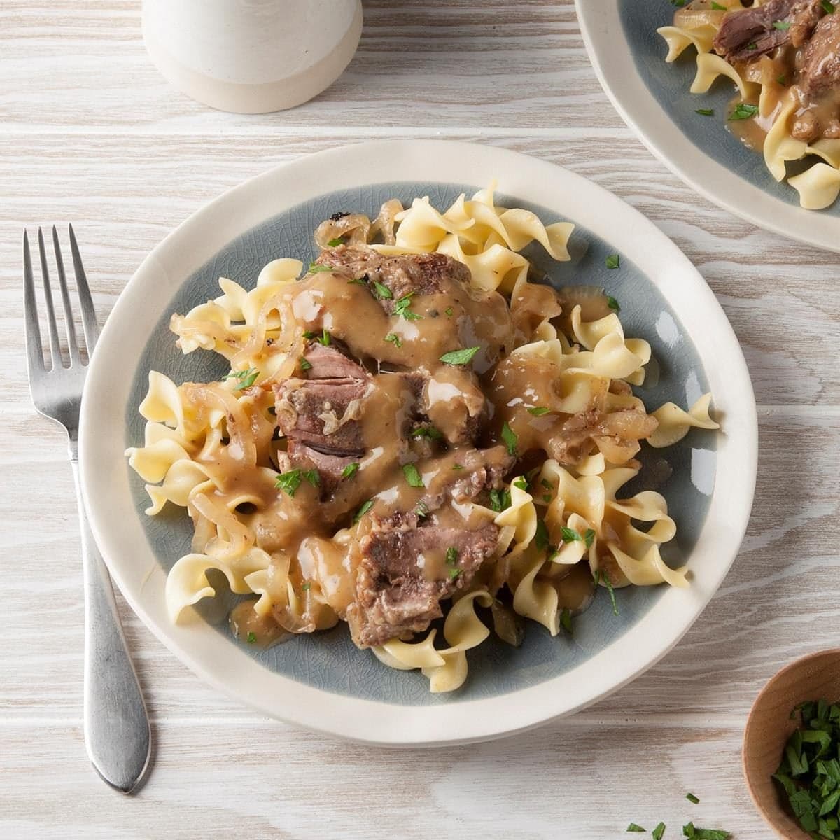 Fork-Tender Swiss Steak with Onion Gravy - Image