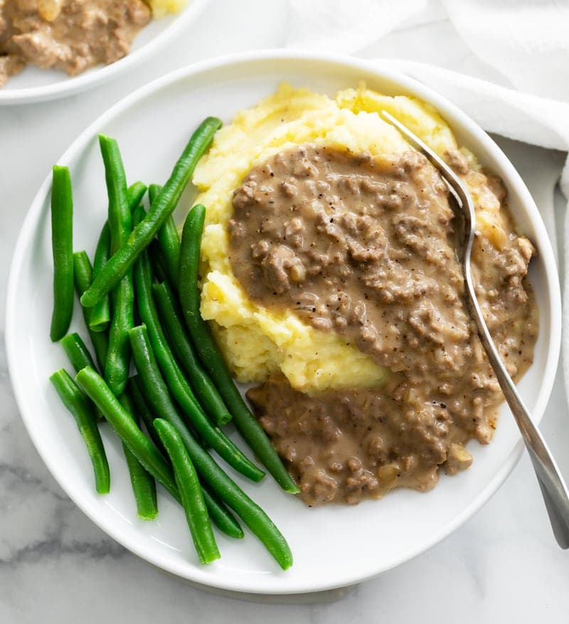 Old-Fashioned Hamburger Gravy over Mashed Potatoes - Image