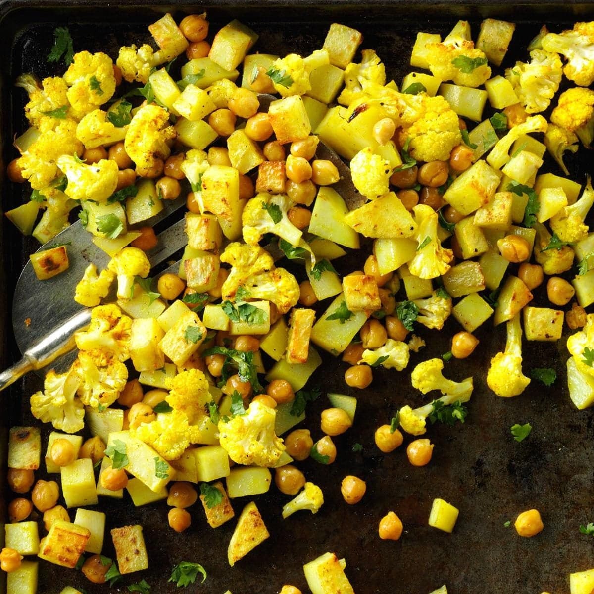Curry-Roasted Cauliflower, Potatoes, and Chickpeas - Image